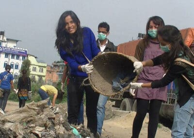 Global Peace Foundation volunteers help clean the Bagmati River.
