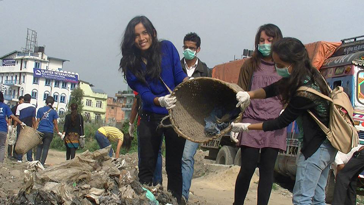 Global Peace Foundation volunteers help clean the Bagmati River.