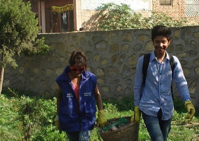 Global Peace Foundation Volunteers clean Guheshwori Peace Park.