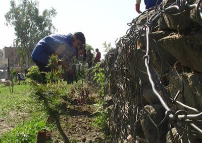 Global Peace Foundation Volunteers clean Guheshwori Peace Park.