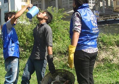 Global Peace Foundation volunteers clean Guheshwori Peace Park.
