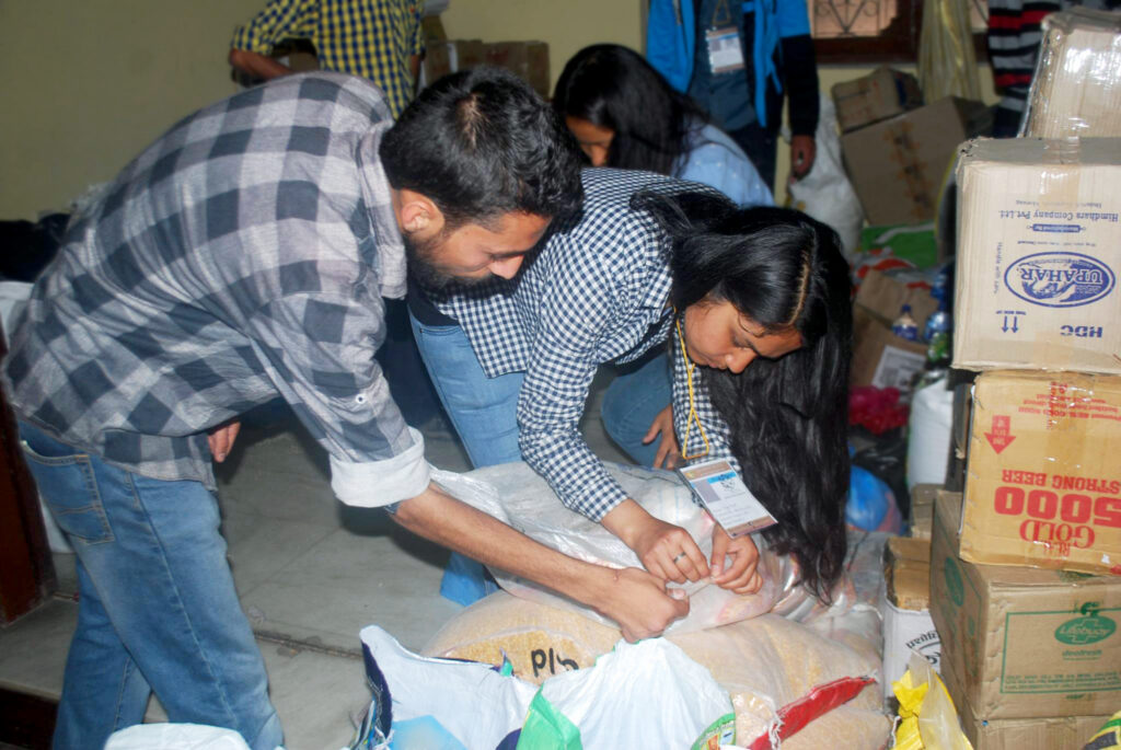 Rise Nepal Volunteers Organize Rice Bags