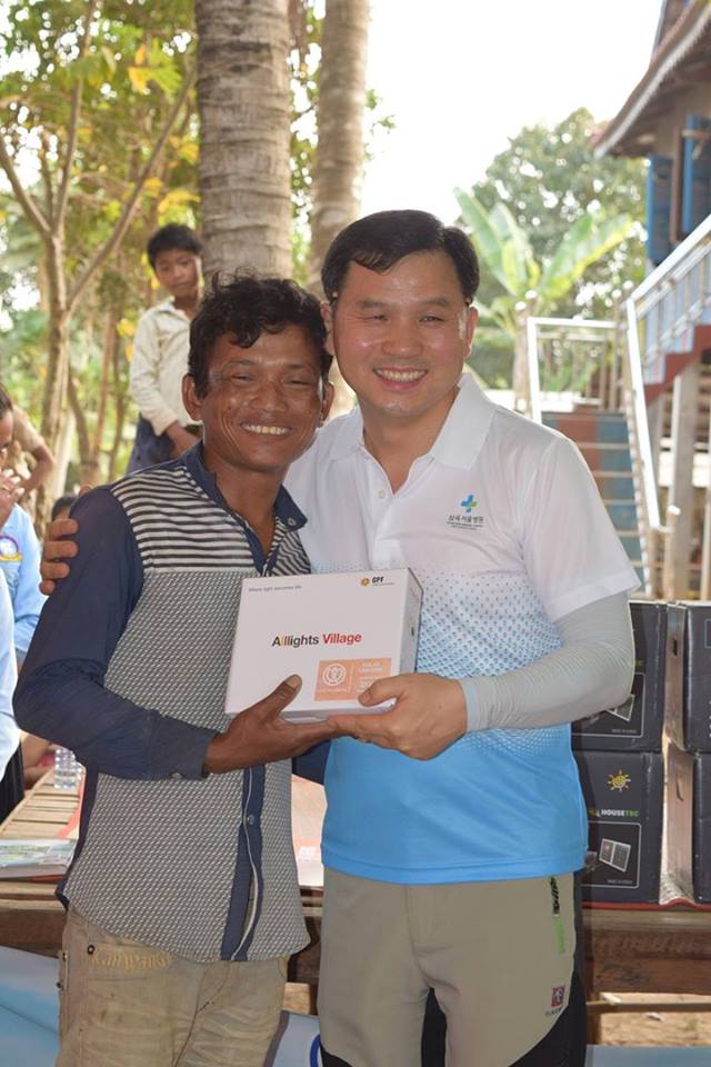 Cambodia Village Children Hold Solar Lamps