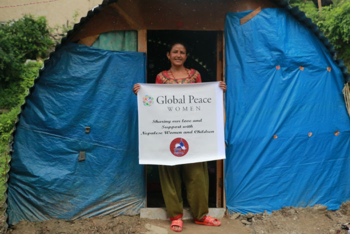 Nepalese Woman Holds GPW Sign