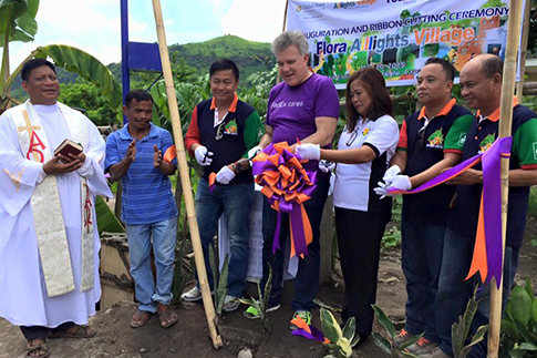 Global Peace Foundation and regional representatives cut celebratory ribbon.