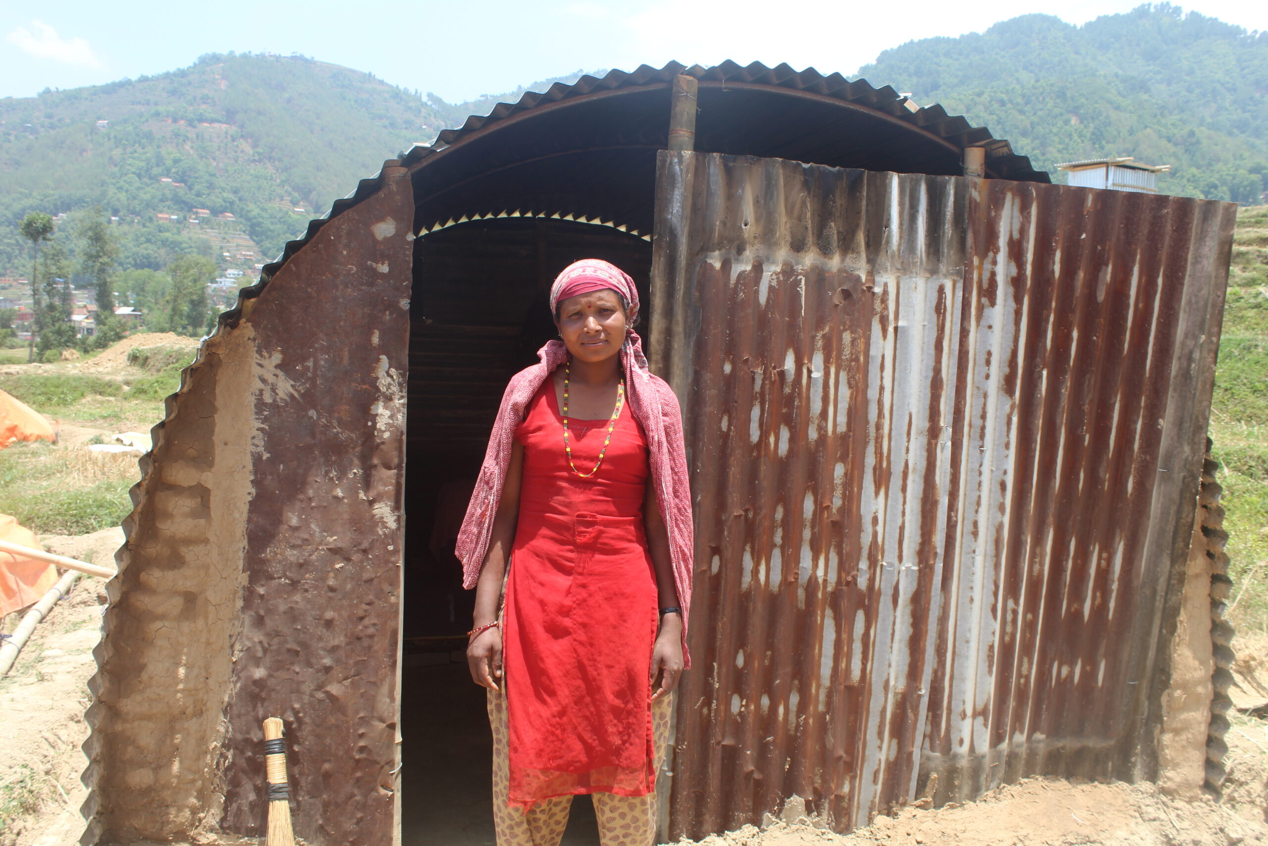 Global Peace Foundation volunteers build transitional shelter for Purnima Bayalkoti.