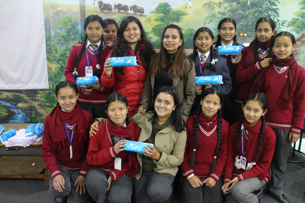 Deepa Neupane (front row, center) brings leadership and health education to students in Nepal