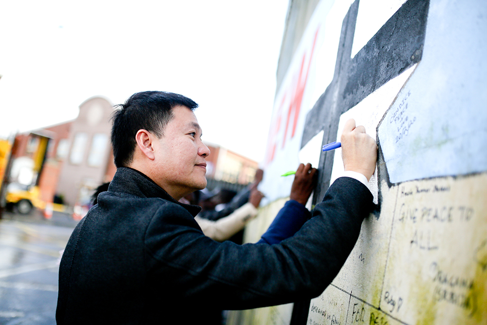 Signing on the Peace Walls
