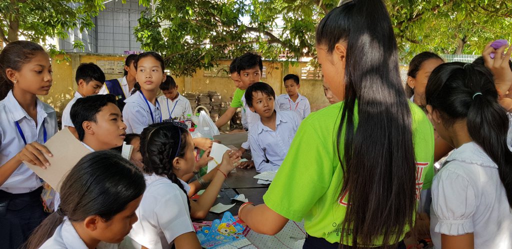 Global Peace Volunteers create interactive activities for students using Peacebook Library in Cambodia