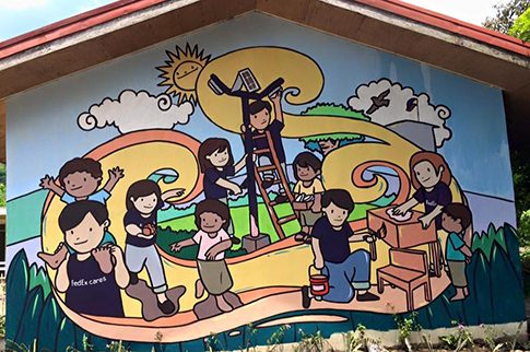 Mural painted on school building by Global Peace Foundation volunteers.