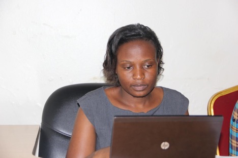 Asiimwe Jackline writing for GPF Uganda