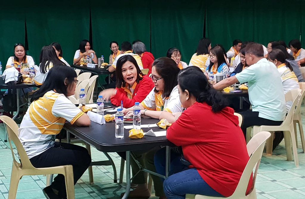 Teachers in group discussion during a CCI seminar in the Philippines