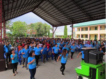 CCI Aliaga students and teachers dance at donation ceremony