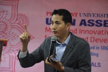 Dr. Teh speaks to students at U-Gen Assembly in Indonesia