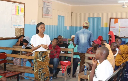 Fatuma addresses her peers at a GPF Tanzania youth leadership training workshop