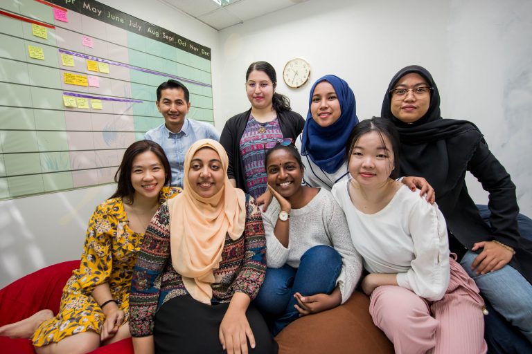Iman Ashraf (front, second from left) with her diverse GPF Malaysia family