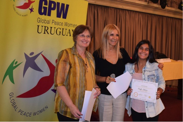 Participants receive certificates for completing the Global Peace Women leadership workshop