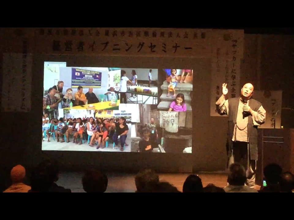 Hideo Kawabata speaking on education initiatives