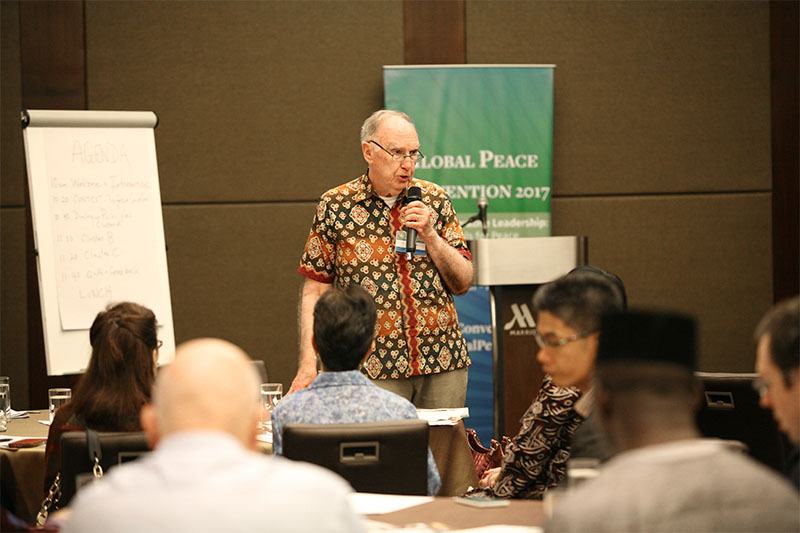 Dr. Leonard Swidler speaks at the Essentials of Peacebuilding Workshop in Manila, Philippines