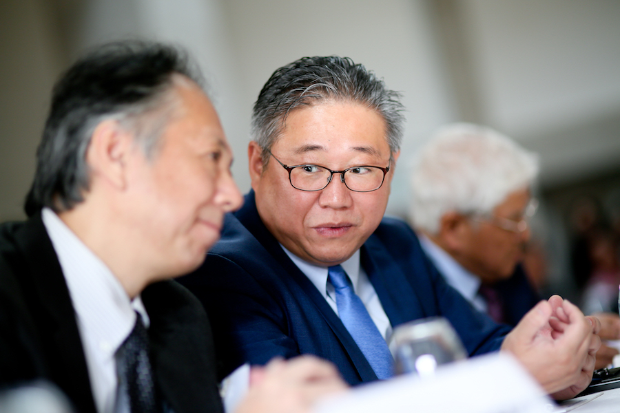 Kenneth Bae with fellow speakers at an International Forum on One Korea