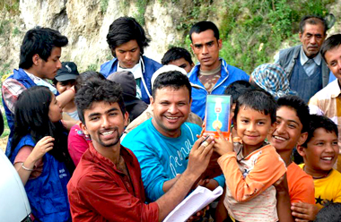 Rise Nepal volunteers distribute solar lanterns