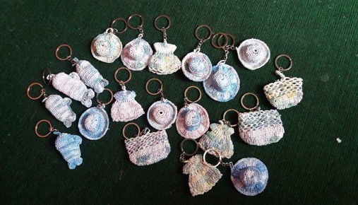 Upcycled keychains made by waste management project participants