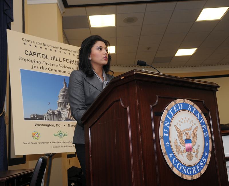 Dr. Rosa Dialal addresses the forum of faith leaders at the U.S. Capitol. [Attribution: Peter Holden]