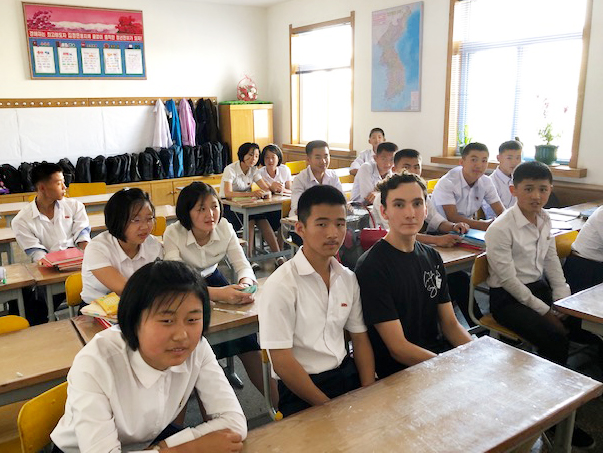 North Korean students sitting with Vladimir