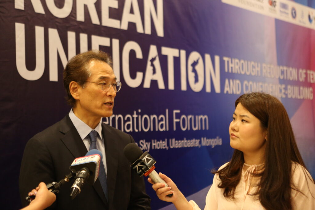 Dr. Jin Shin, Director at National Strategy Institute speaks with media at Korea Unification forum in Mongolia