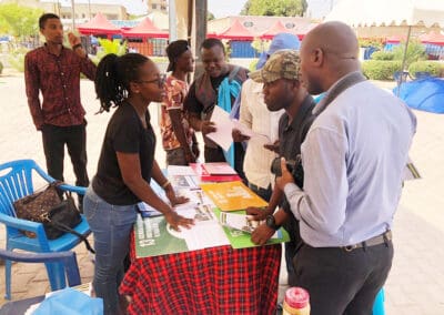 Hortencia Nuhu explaining about works of Youth of United Nations Association YUNA