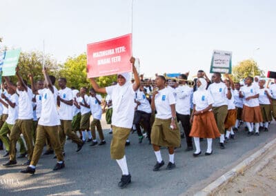 A peaceful match of youths and students, carrying various peace messages as a symbol of celebrating International Peace Day.