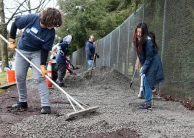Volunteers Level Gravel on Heavily Used Trail