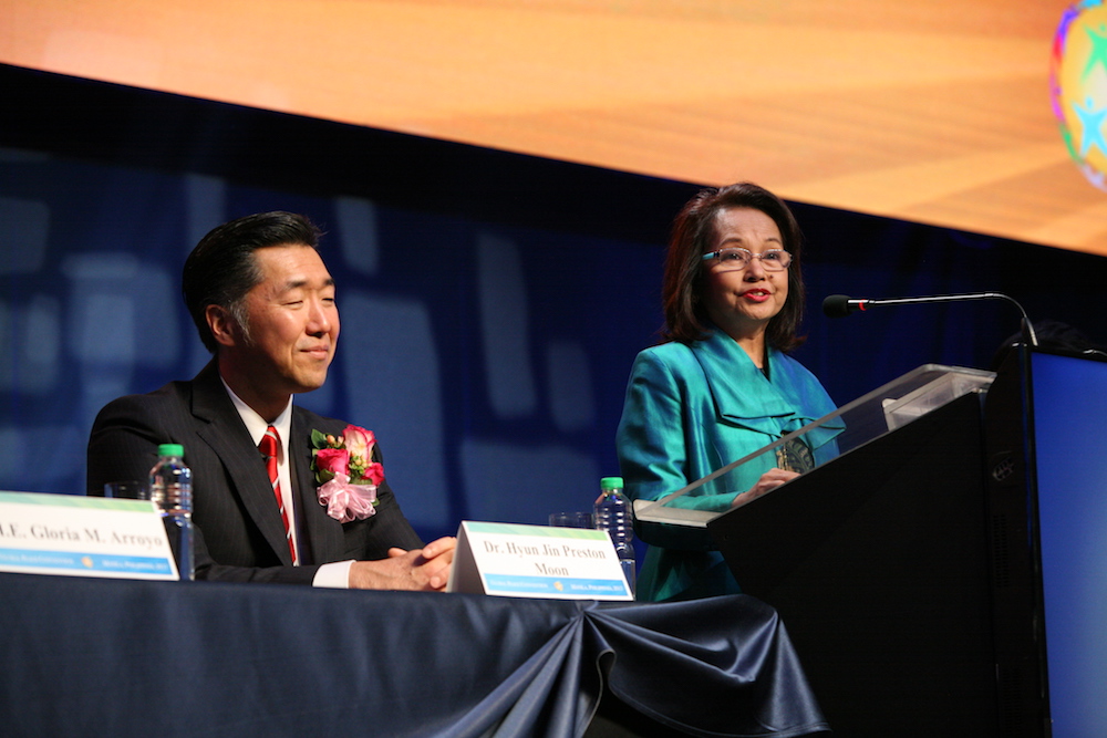 Arroyo and Chairman Moon at the opening plenary