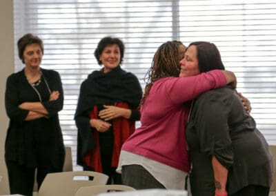 Darlene Tart Embraces Anne Marie Jones