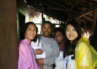 Volunteer with local host family.