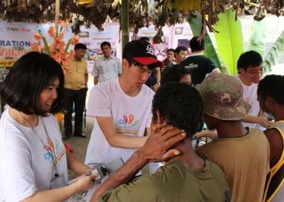 Solar powered lamp distribution in Sitio Flora.