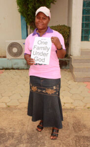 A participant supports One Family under God campaign.