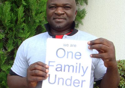 A Participant Shows Support for "One Family under God"