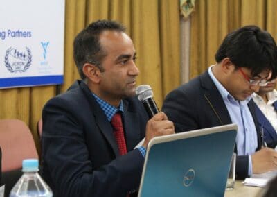 Rev. George Rhee, Minister in the Assemblies of God Church in the United Kingdom and Founder of Love North Korean Children speaks at the Capitol Hill Forum.