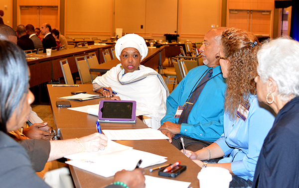 Participants conversate during Interfaith session