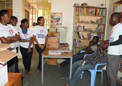 Africa Peace Service Corps Volunteers clean library in Mathare, Kenya