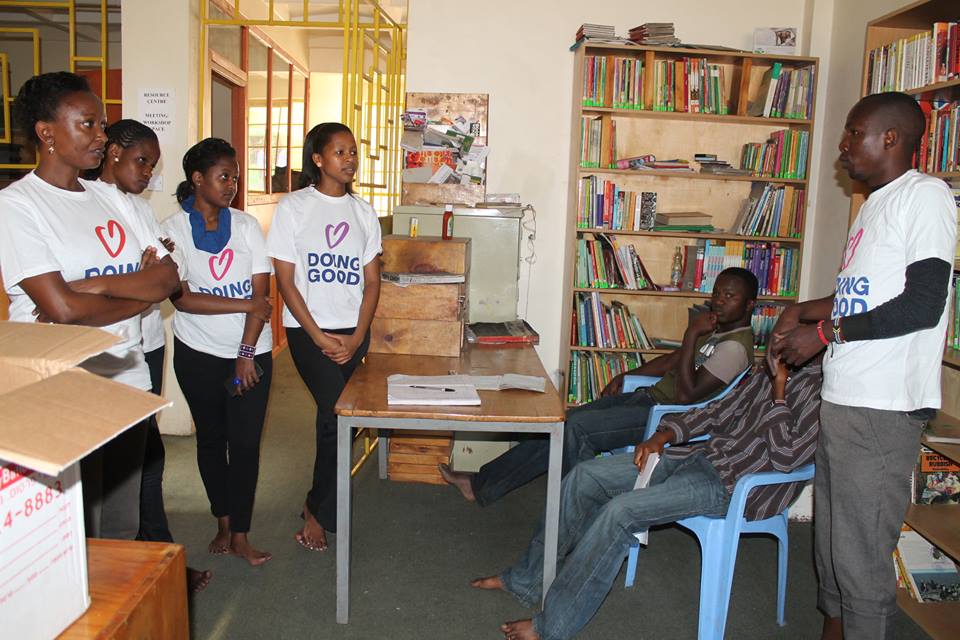 Africa Peace Service Corps Volunteers clean library in Mathare, Kenya