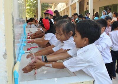 School children wash hands at newly built washing area