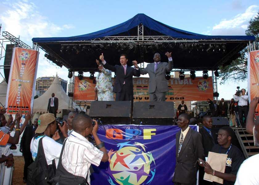 Prime Minister Raila Odinga and his wife Ida Odinga with Dr. Hyun Jin Moon, Chairman of the Global Peace Foundation, at the stage of the Global Peace Festival 2008 Nairobi, Kenya.