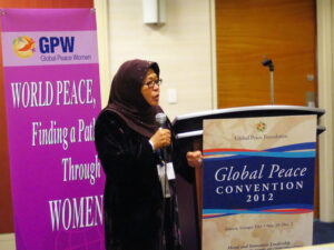 Dr. Tan Sri Zaleha Ismail, Chairman of Global Peace Festival Malaysia, addresses the audience at the Global Peace Women networking luncheon in Atlanta for the 2012 GPC.