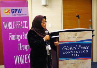 Dr. Tan Sri Zaleha Ismail, Chairman of Global Peace Festival Malaysia, addresses the audience at the Global Peace Women networking luncheon in Atlanta for the 2012 GPC.