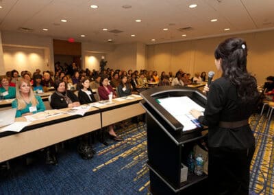 Dr. Jun Sook Moon addresses a packed room of participants at the 2012 Global Peace Convention (GPC) in Atlanta, Georgia, United States.