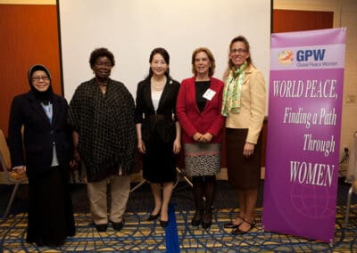 Dr. Tan Sri Zaleha Ismail, Chairman of GPF-Malaysia, Hon. Molly Ruth Lamatia, Parliamentarian of Uganda, Mrs. Jun Sook Moon, Chairwoman of Global Peace Women, Mrs. Maria Lacalle, former first lady of Uruguay, and moderator, Mrs. Murray.