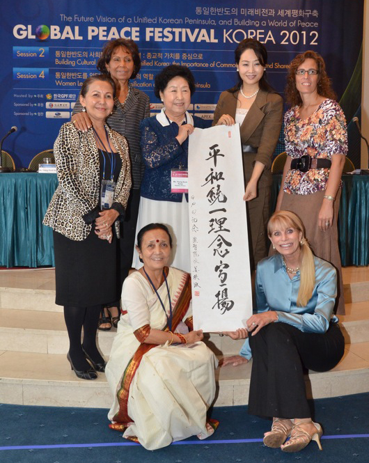Global Peace Women from around the world gather around the words of peace.