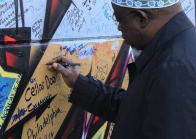 Attendee adds to Belfast Peace Walls.